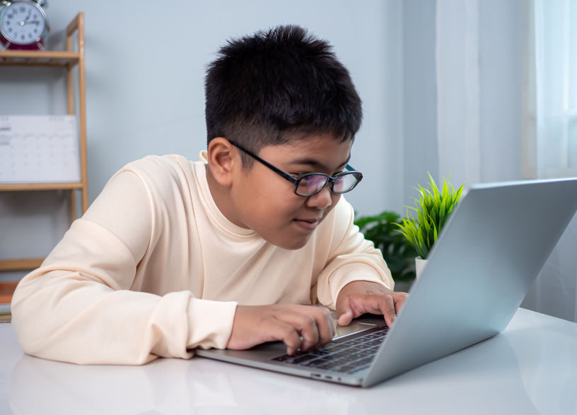 little-asian-boy-student-using-computer-laptop-learning-educati